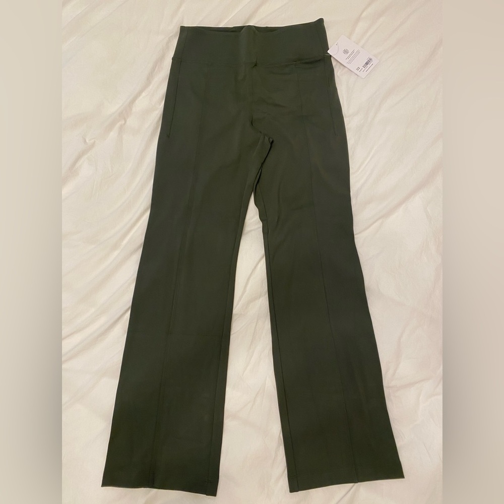 Athleta size 8 legging pants in dark olive green